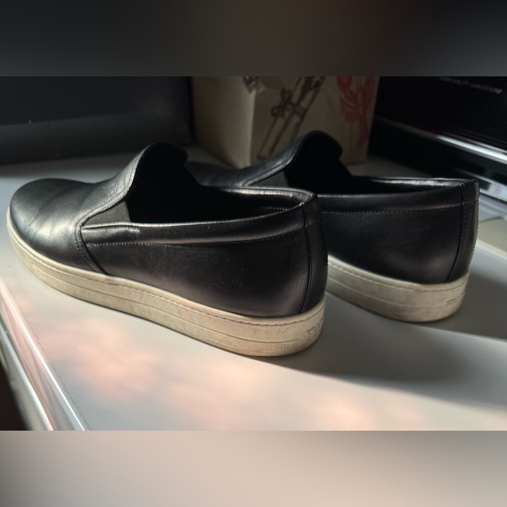 Prada Men's Black Slip-On Loafers..
Fit large I’m 10.5 - 11 and fit perfectly. - Picture 2 of 8